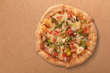 italian pizza on cardboad box. Top view