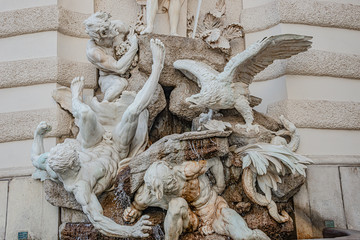 Power of Land fountain at Hofburg Imperial Palace ant Saint Michael Square, outdoor, Vienna, Austria