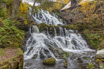 A waterfall in a forest in central Sweden photographed with a long exposure.