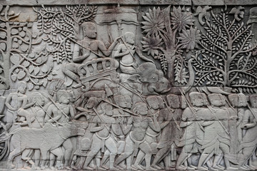 Bas relief on the walls of Bayon Temple in Angkor Thom, ancient city of the Khmer Empire. Cambodia