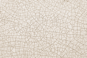 Texture of old white ceramic pottery or tile with cracks, real photo - obrazy, fototapety, plakaty
