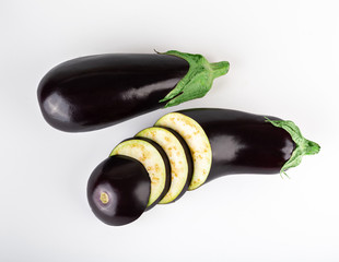 fresh eggplant, cut into slices, isolated on a white background