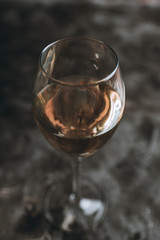 White wine on the rustic background. Selective focus. Shallow depth of field.