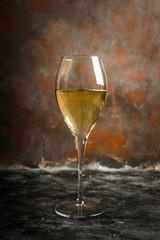 White wine on the rustic background. Selective focus. Shallow depth of field.