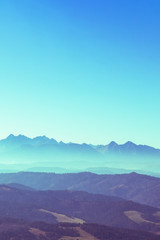 Surreal mountain landscape, turquoise gree mountains and sky, creative inspiration nature concept