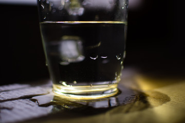 background photo A glass of water with light and shadow abstract beautiful vivid fresh thirsty...