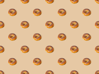 fresh buns on beige background, seamless pattern