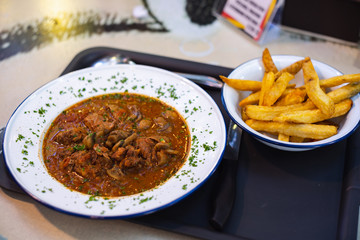 Braised Beef Cheeks Stew with homemade frenchfries
