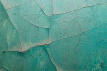 Old painted wall with cracked paint