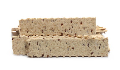 Crunchy flaxseed, linseed crackers, integral snacks isolated on white background