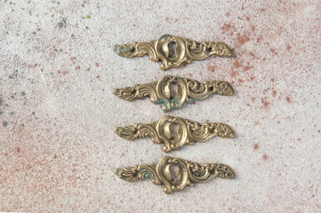 Four antique brass keyholes lock covers