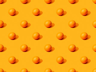 ripe oranges on colorful background, seamless pattern
