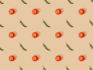 top view of tomatoes and jalapenos on beige background, seamless pattern
