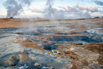 Hverarond geothermal area in Myvatn, Iceland. Steam vents and hot pools, muddy hot soil, sulfur...