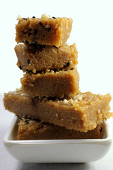 Sukhadi or Gor Papdi is Indian Traditional sweet made with wheat flour,desi ghee,jaggeery and nuts.very healthy Gujarati Mithai