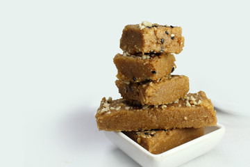 Sukhadi or Gor Papdi is Indian Traditional sweet made with wheat flour,desi ghee,jaggeery and nuts.very healthy Gujarati Mithai