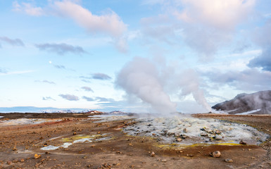Hverarond geothermal area in Myvatn, Iceland. Steam vents and hot pools, muddy hot soil, sulfur...