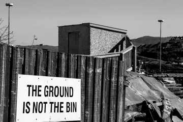 the ground is not the bin sign