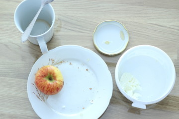 Apple left after lunch. On the plate.