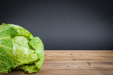 Vegetarian healthy food. Source of protein for vegetarians. Healthy eating: vegetable, cabbage on dark background.