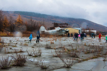 An old plane at a closed airport on an excursion.