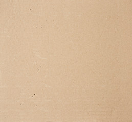 piece of smooth brown cardboard paper, full frame