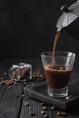 Close-up of coffee poured into glass