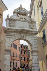 Balbi's Arch, an entrance gate to the old town of Rovinj, Croatia, leading to Grisia Street. Famous landmark in Rovinj