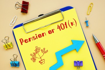 Financial concept meaning Pension or 401(k) with sign on the piece of paper.