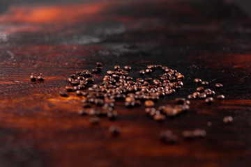 Coffee beans on the wooden table