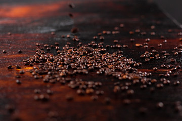 Coffee beans on the wooden table