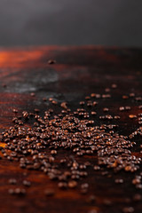 Coffee beans on the wooden table