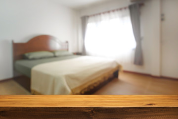 Bedroom and empty wooden desk space platform for product presentation.