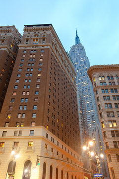 Midtown, Manhattan, New York City, NY, United States - Empire State building from buildings from Greeley Square.