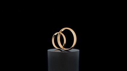 Two classic style wedding golden rings rotating in front of camera, looped 3D animation - Powered by Adobe
