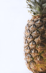 Ripe pineapple shot on a white background