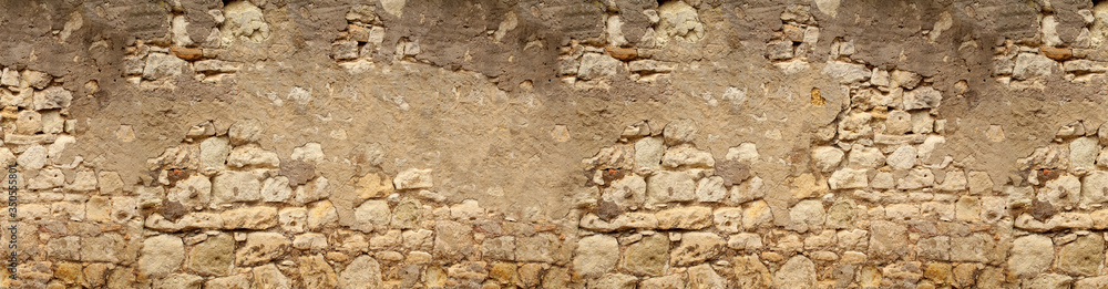 Wall mural seamless horizontal texture of an old wall made of rubble stone, brown sandstone, with the remains of cracked old stucco, a blank for the designer, wallpaper, panorama