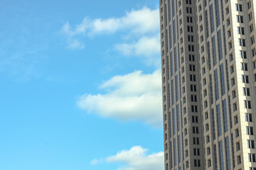 Generic office building set against blue sky in urban Atlanta
