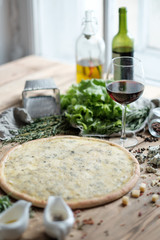 pizza with cheese with ingredient on the wooden table in rustik style