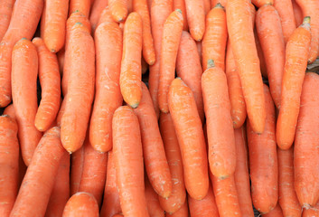 Carrots background. Vegetables pattern.