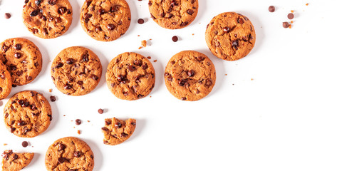 Chocolate chip cookies panorama on a white background, shot from the top with copy space