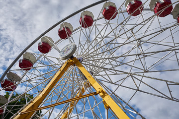A Ferris wheel at the County Fair in the summer time