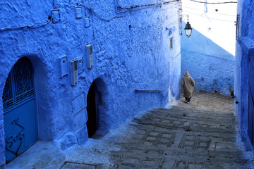 Chefchaouen, Morocco - 02.24.2019: View from the city street where all buildings are painted only in blue.