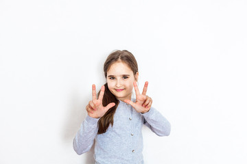 Child, girl, different emotions, white background, isolate, portrait, laughter, fright, joy, language, hands, joy