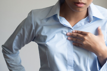 sick woman with indigestion problem, acid reflux or gerd symptoms; woman health care, body care,...