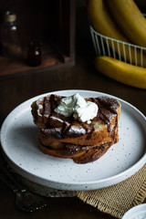 Toast with banana and curd cheese. A simple idea for breakfast.
