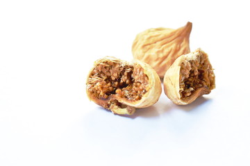 baked dry fig half cutting on white background
