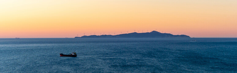Obraz premium Panoramic shot of sunset and Aegean sea in Greece