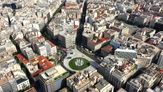 Aerial 4k footage of fountain and square of Omonia in the heart of Athens centre, Attica, Greece