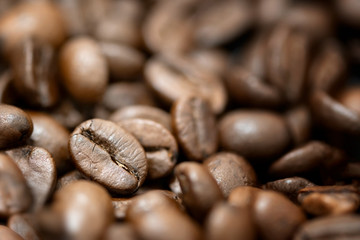 Top view of brown roasted coffee beans, can be use as background, copy space for text.